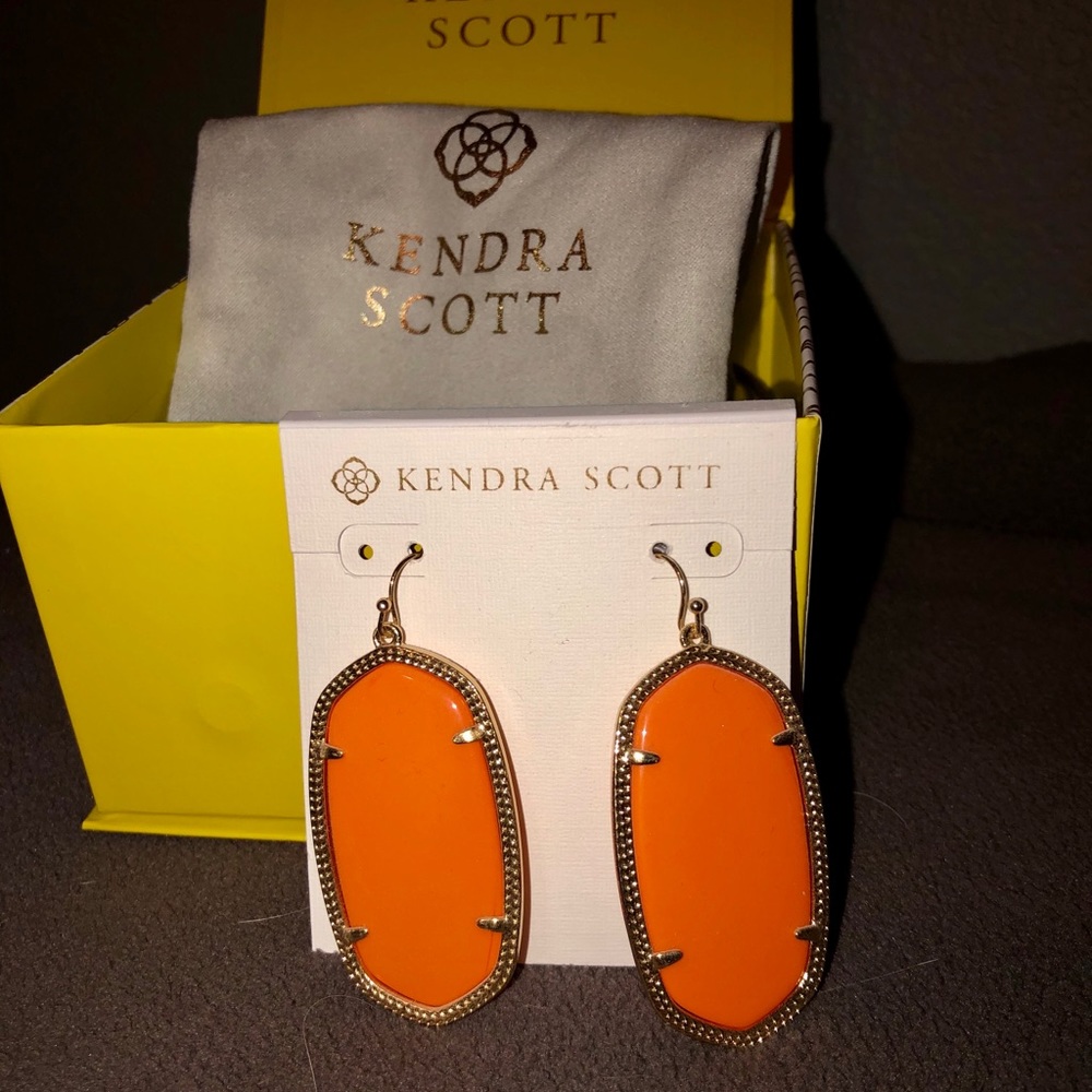 Kendra Scott orange Danielle dangle earrings.